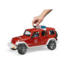 BRUDER - JEEP WRANGLER UNLIMITED RUBICON DE POMPIERI CU FIGURINA - BR02528