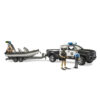 Bruder camion de politie RAM 2500 cu lumini si sunete si remorca cu barca - BR02507