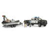 Bruder camion de politie RAM 2500 cu lumini si sunete si remorca cu barca - BR02507